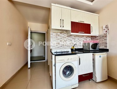 Compact studio with a total area of 30 m2, on the 10th floor in a residential complex built in 2014-id-8136-photo-3