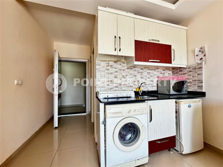 Compact studio with a total area of 30 m2, on the 10th floor in a residential complex built in 2014-id-8136-photo-3