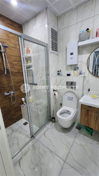 Современная квартира 2+1 в 650 метрах от моря, в центре района Махмутлар-id-8137-фото-9