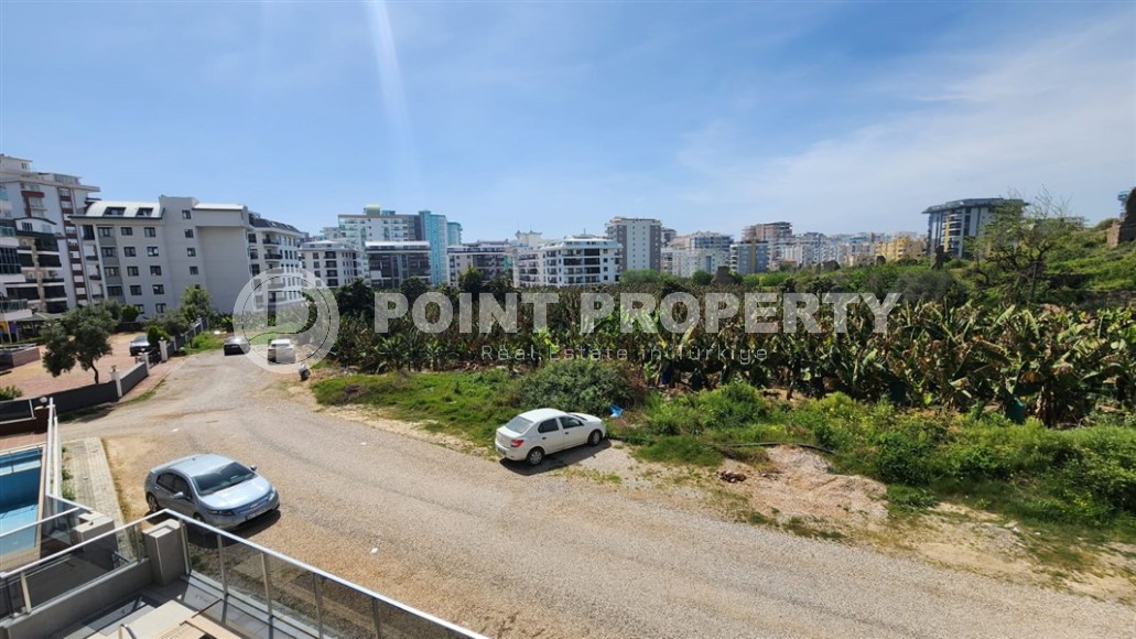 Modern apartment 2+1 650 meters from the sea, in the center of Mahmutlar-id-8137-photo-11