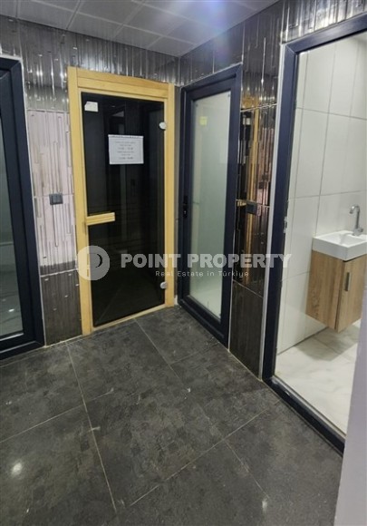 Современная квартира 2+1 в 650 метрах от моря, в центре района Махмутлар-id-8137-фото-16