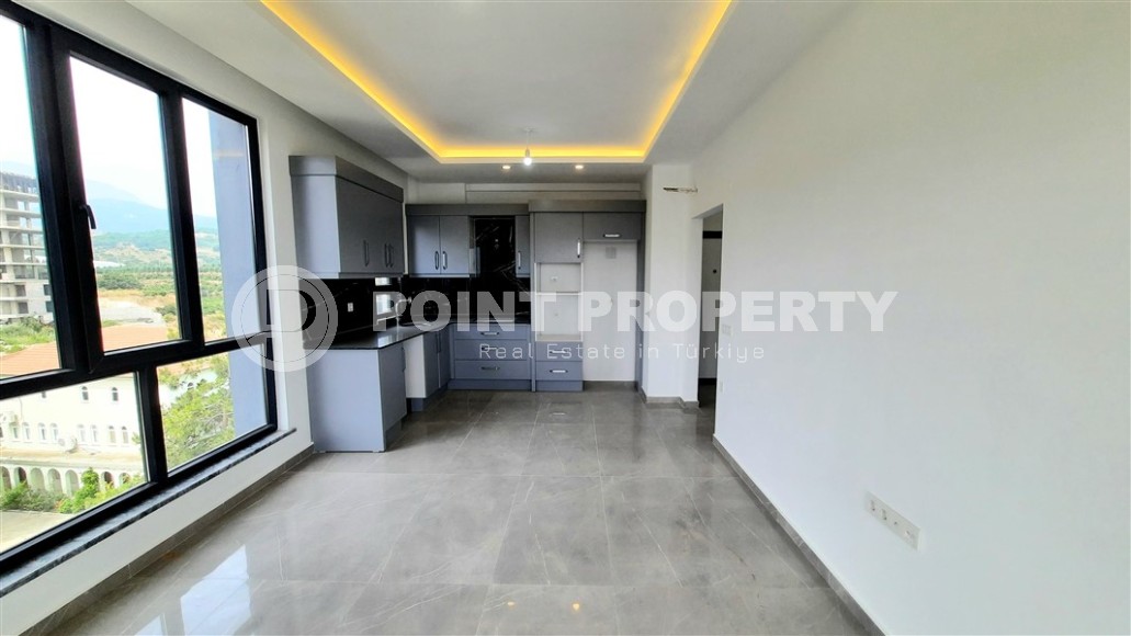 Стильная квартира с видом на море, Демирташ, Алания.-id-8139-фото-2