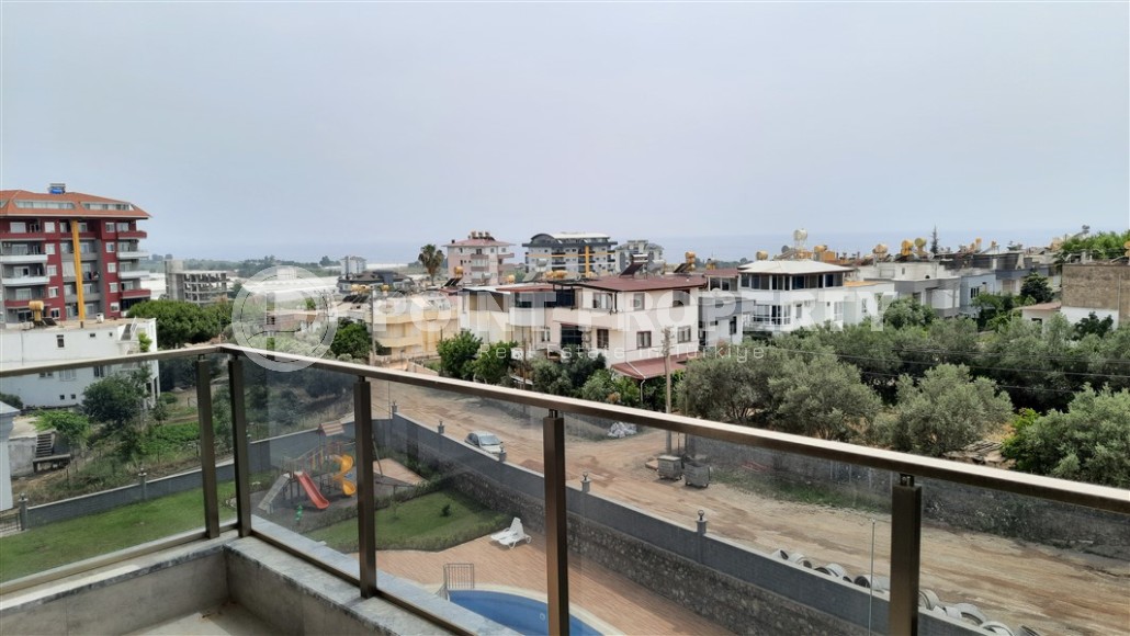 Стильная квартира с видом на море, Демирташ, Алания.-id-8139-фото-8