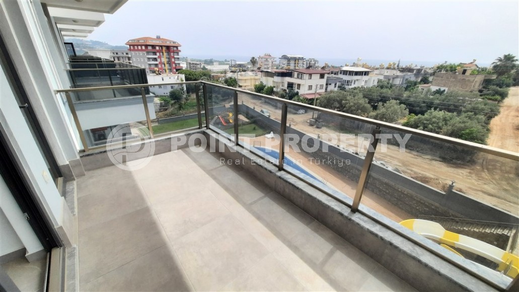 Стильная квартира с видом на море, Демирташ, Алания.-id-8139-фото-9