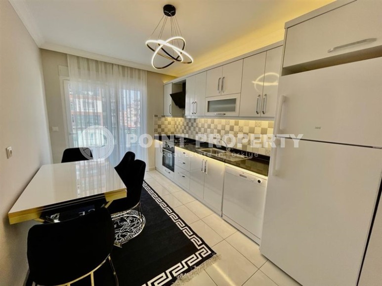 Стильные просторные апартаменты 2+1 в центре района Махмутлар-id-8143-фото-4