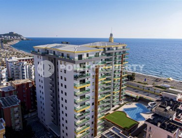 Panoramic apartment 2+1 on the first coastline in the center of Mahmutlar-id-8144-photo-1