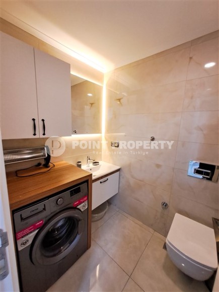 Panoramic apartment 2+1 on the first coastline in the center of Mahmutlar-id-8144-photo-12