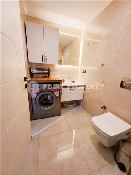 Panoramic apartment 2+1 on the first coastline in the center of Mahmutlar-id-8144-photo-13