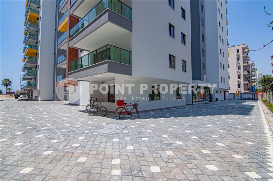 Panoramic apartment 2+1 on the first coastline in the center of Mahmutlar-id-8144-photo-28