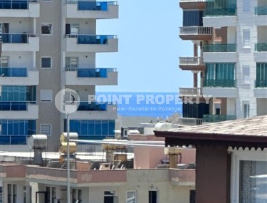 Spacious 1+1 apartment on the 3rd floor of a new modern complex in the center of Mahmutlar-id-8157-photo-2