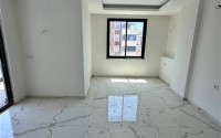 Spacious 1+1 apartment on the 3rd floor of a new modern complex in the center of Mahmutlar-id-8157-photo-3