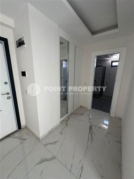 Spacious 1+1 apartment on the 3rd floor of a new modern complex in the center of Mahmutlar-id-8157-photo-7