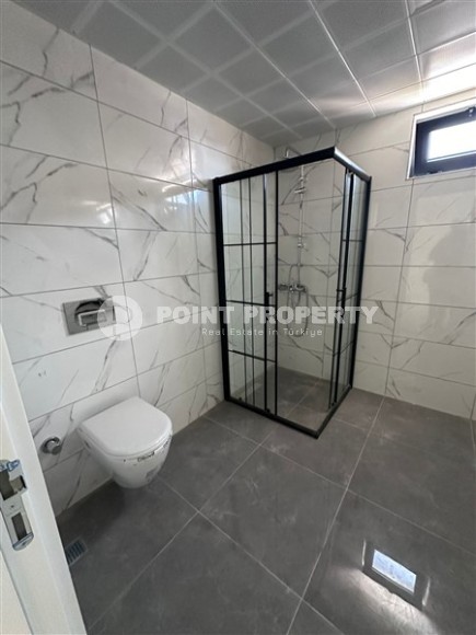 Spacious 1+1 apartment on the 3rd floor of a new modern complex in the center of Mahmutlar-id-8157-photo-8