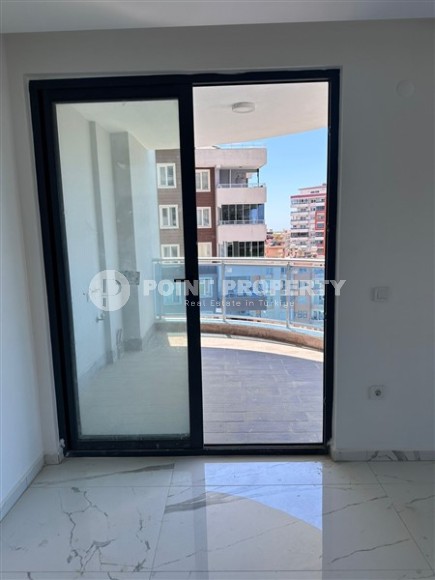 Spacious 1+1 apartment on the 3rd floor of a new modern complex in the center of Mahmutlar-id-8157-photo-9