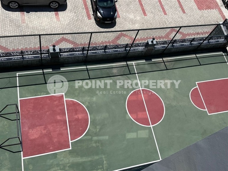 Spacious 1+1 apartment on the 3rd floor of a new modern complex in the center of Mahmutlar-id-8157-photo-12