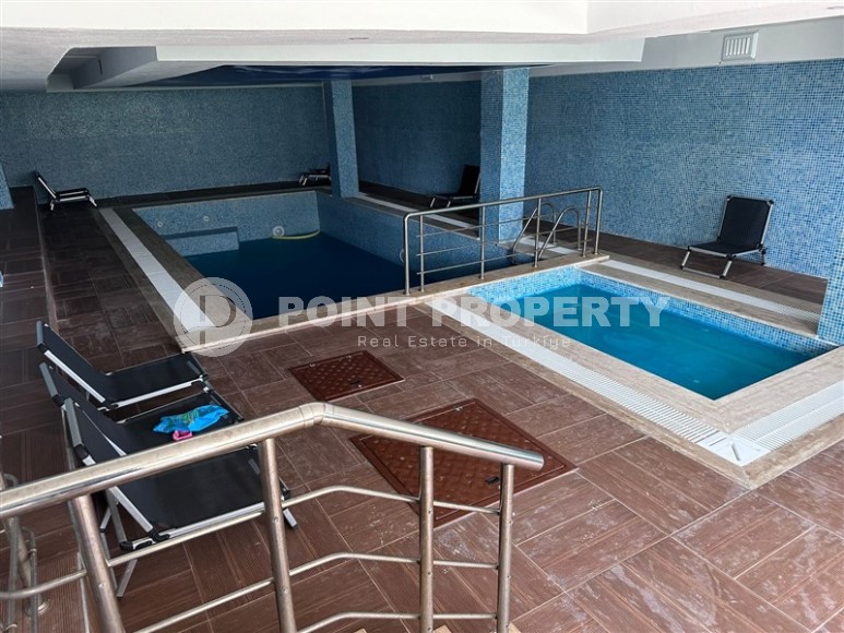 Spacious 1+1 apartment on the 3rd floor of a new modern complex in the center of Mahmutlar-id-8157-photo-14