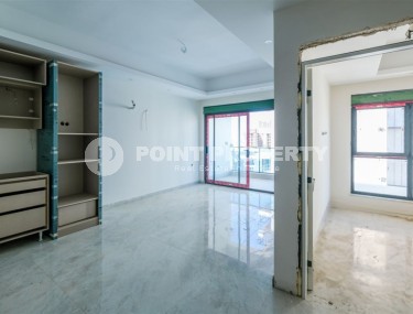 Новая квартира 1+1 в современном жилом комплексе на 1-м этаже в Махмутлар-id-8162-photo-2