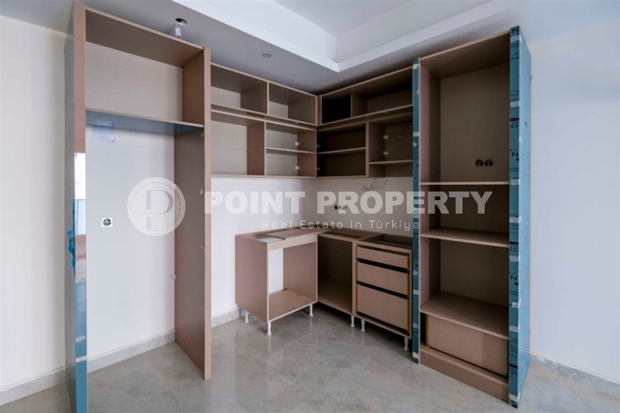 Новая квартира 1+1 в современном жилом комплексе на 9-м этаже в Махмутларе-id-8162-фото-4