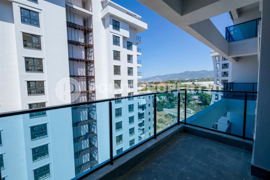 Новая квартира 1+1 в современном жилом комплексе на 9-м этаже в Махмутларе-id-8162-фото-10