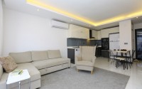 Cozy 1+1 apartment in a modern building on the 2nd floor, in the center of Alanya-id-8165-photo-2