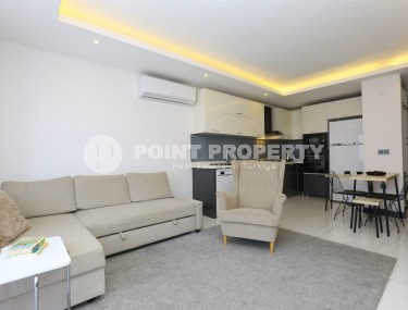 Cozy 1+1 apartment in a modern building on the 2nd floor, in the center of Alanya-id-8165-photo-2