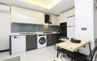 Cozy 1+1 apartment in a modern building on the 2nd floor, in the center of Alanya-id-8165-photo-3