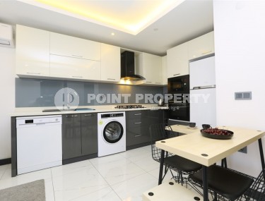 Cozy 1+1 apartment in a modern building on the 2nd floor, in the center of Alanya-id-8165-photo-3