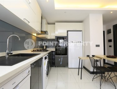 Cozy 1+1 apartment in a modern building on the 2nd floor, in the center of Alanya-id-8165-photo-4