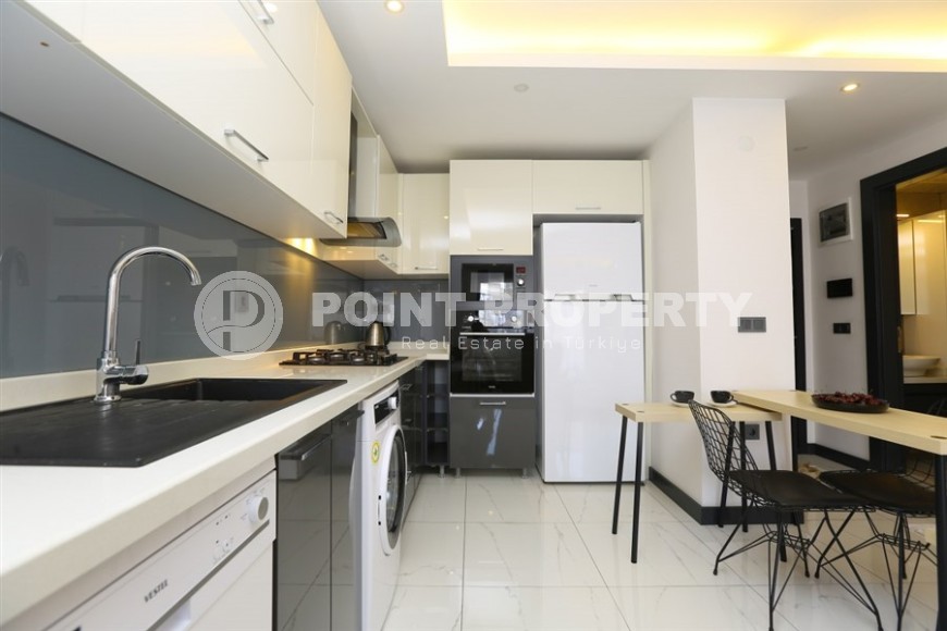 Cozy 1+1 apartment in a modern building on the 2nd floor, in the center of Alanya-id-8165-photo-4