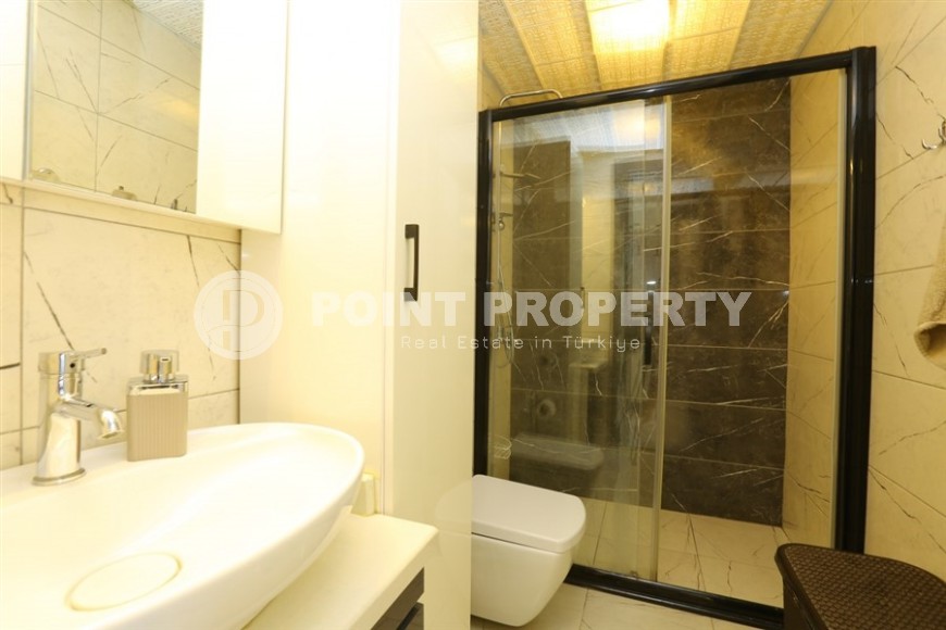 Cozy 1+1 apartment in a modern building on the 2nd floor, in the center of Alanya-id-8165-photo-8