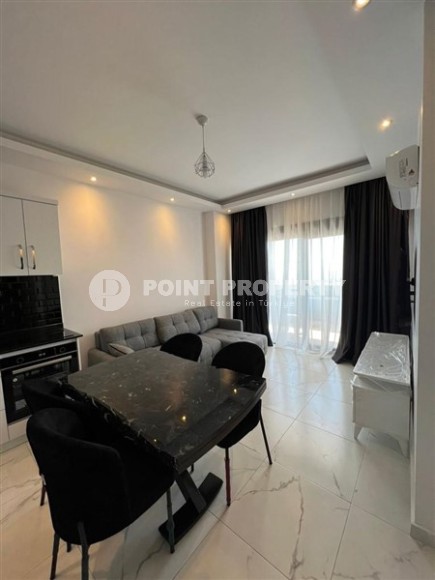 Уютная квартира 1+1 в современном доме на 4-м этаже в Авсалларе-id-8166-фото-2