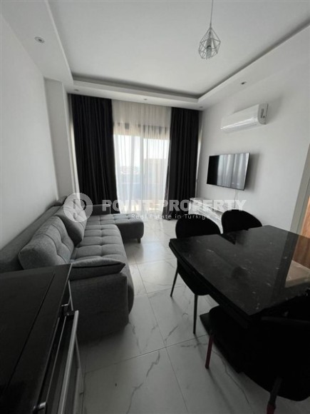 Уютная квартира 1+1 в современном доме на 4-м этаже в Авсалларе-id-8166-фото-3