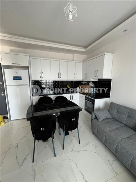 Уютная квартира 1+1 в современном доме на 4-м этаже в Авсалларе-id-8166-фото-4