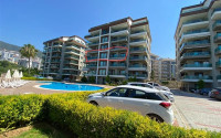 Furnished four-room apartment, 165m², in a new comfortable complex in Oba, Alanya-id-1639-photo-1