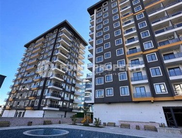 Недорогая квартира в Махмутларе 2+1 в новом доме-id-8171-фото-1