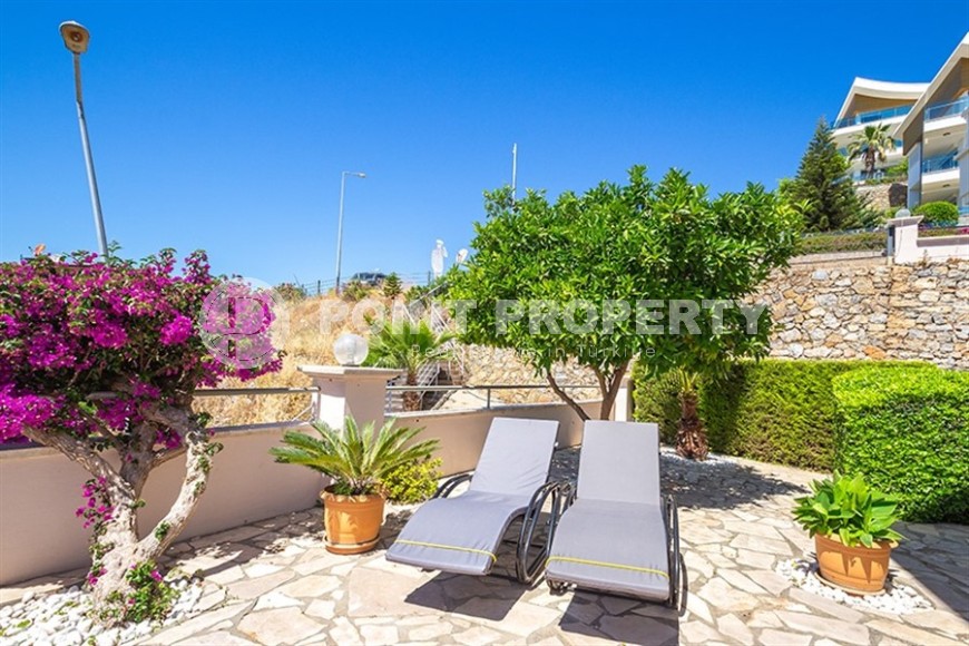 Роскошная квартира 2+1 с собственным садом и видом на море в Конаклы-id-8177-фото-17