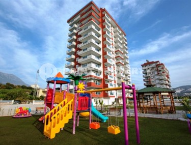 Three-room apartment in a good building in Mahmutlar-id-8196-photo-1