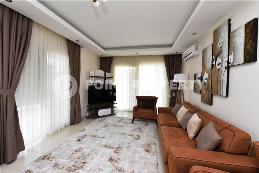 Трехкомнатная квартира в добротном доме в Махмутларе-id-8196-фото-2