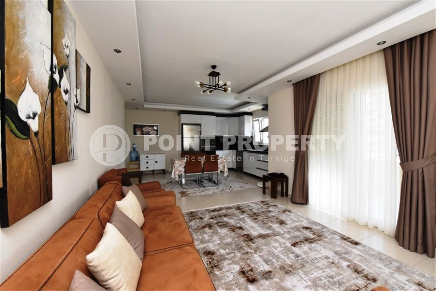 Трехкомнатная квартира в добротном доме в Махмутларе-id-8196-фото-3