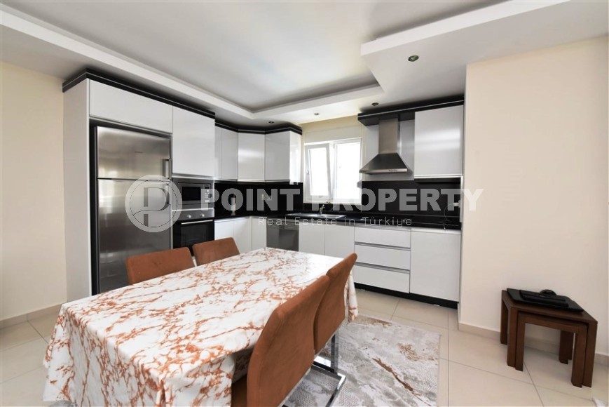 Трехкомнатная квартира в добротном доме в Махмутларе-id-8196-фото-5