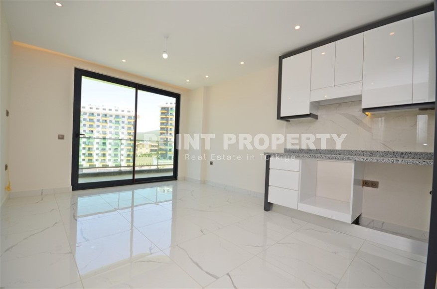 For sale a cozy 1+1 apartment with sea views in the Avsallar area, Alanya!-id-8205-photo-2