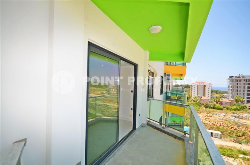 For sale a cozy 1+1 apartment with sea views in the Avsallar area, Alanya!-id-8205-photo-11