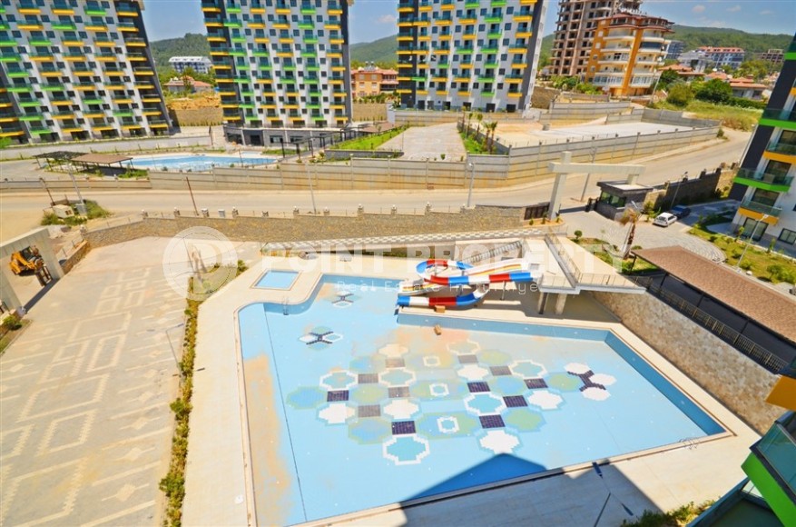 For sale a cozy 1+1 apartment with sea views in the Avsallar area, Alanya!-id-8205-photo-12
