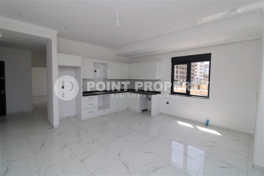 Spacious new apartment in vibrant Mahmutlar!-id-8220-photo-2