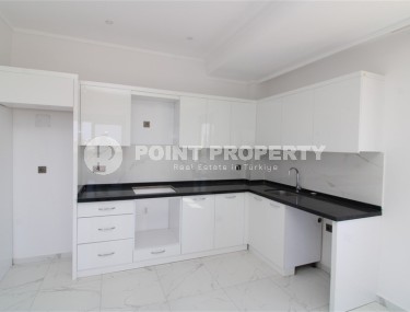 Просторная новая квартира в оживленном Махмутларе!-id-8220-фото-3