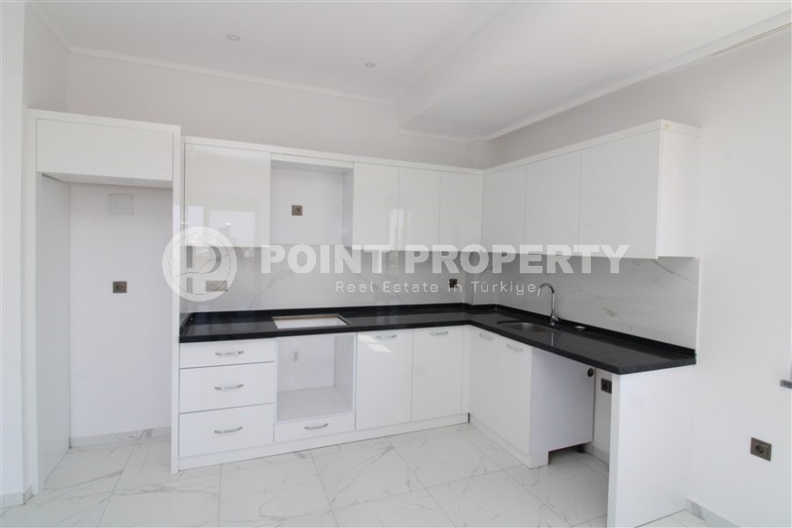 Spacious new apartment in vibrant Mahmutlar!-id-8220-photo-3