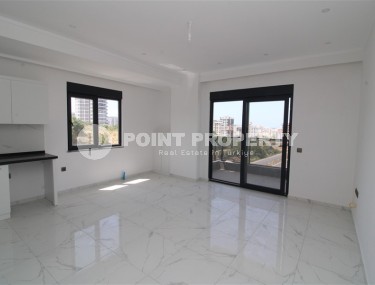 Просторная новая квартира в оживленном Махмутларе!-id-8220-фото-4