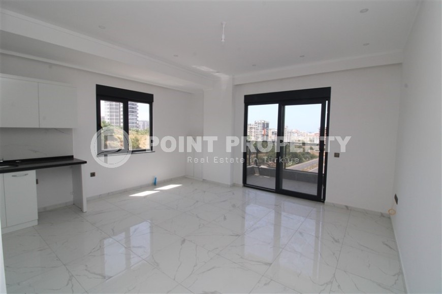 Spacious new apartment in vibrant Mahmutlar!-id-8220-photo-4