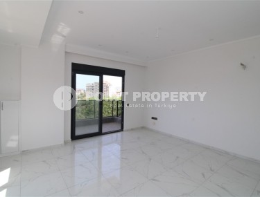 Просторная новая квартира в оживленном Махмутларе!-id-8220-фото-5