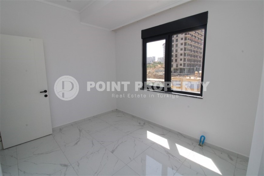 Spacious new apartment in vibrant Mahmutlar!-id-8220-photo-6